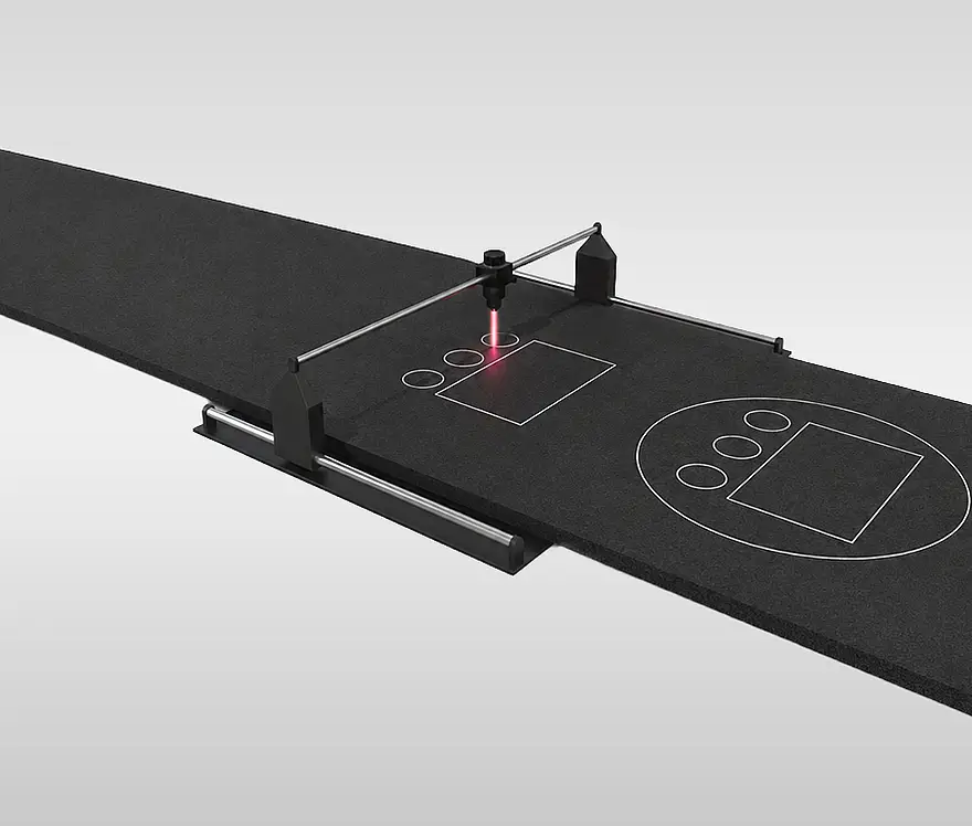 Illustration einer Laseranlage, die Konturen aus einer dunklen EPDM-Bahn schneidet